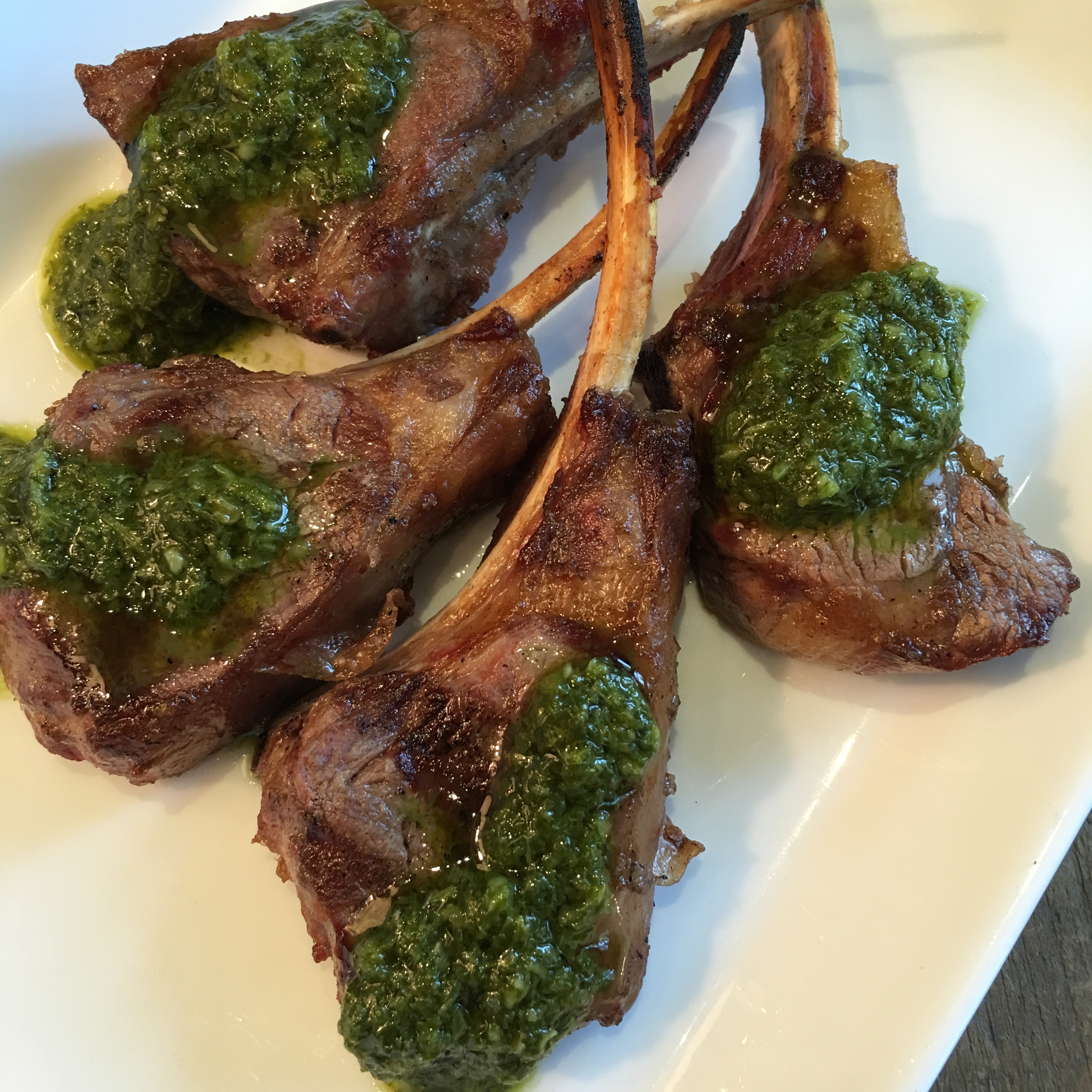 chimichurri sauce on lamb racks